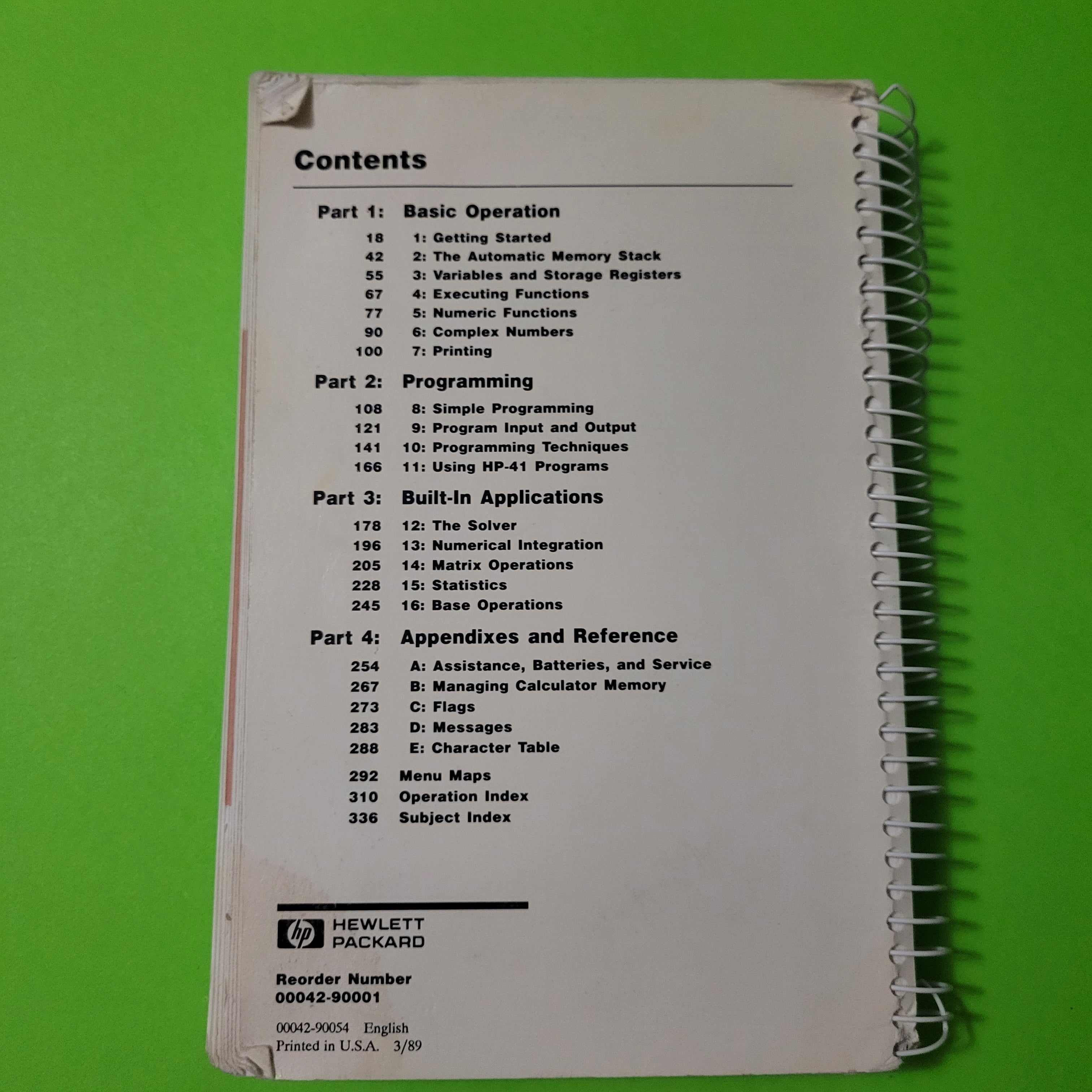 An image of the back of the manual of a HP 42s RPN Scientific Calculator